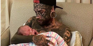 A 24-year-old father, who has several tattoos all over his body, makes the decision to get them erased for his child