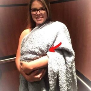 The woman carried a blanket covering what everyone assumed was a child into the hospital, but what she hid surprised everyone