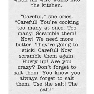 A man is scrambling eggs when his wife walks into the kitchen.